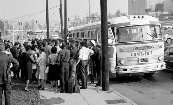 A group of Nashville black and white aboard a couple of buses Aug. 27, 1963, at the First Baptist Church downtown for a trip to Washington D.C. for the "March for jobs and freedom." They were part of 200,000 that massed before the Abraham Lincoln Memorial and hear the Rev. Martin Luther King Jr.'s famous "I Have a Dream" speech. In the white hat at the bus' door is one of the student demonstrator leaders, Lester McKinnie.
Photo Credit: Bill Preston / The Tennessean